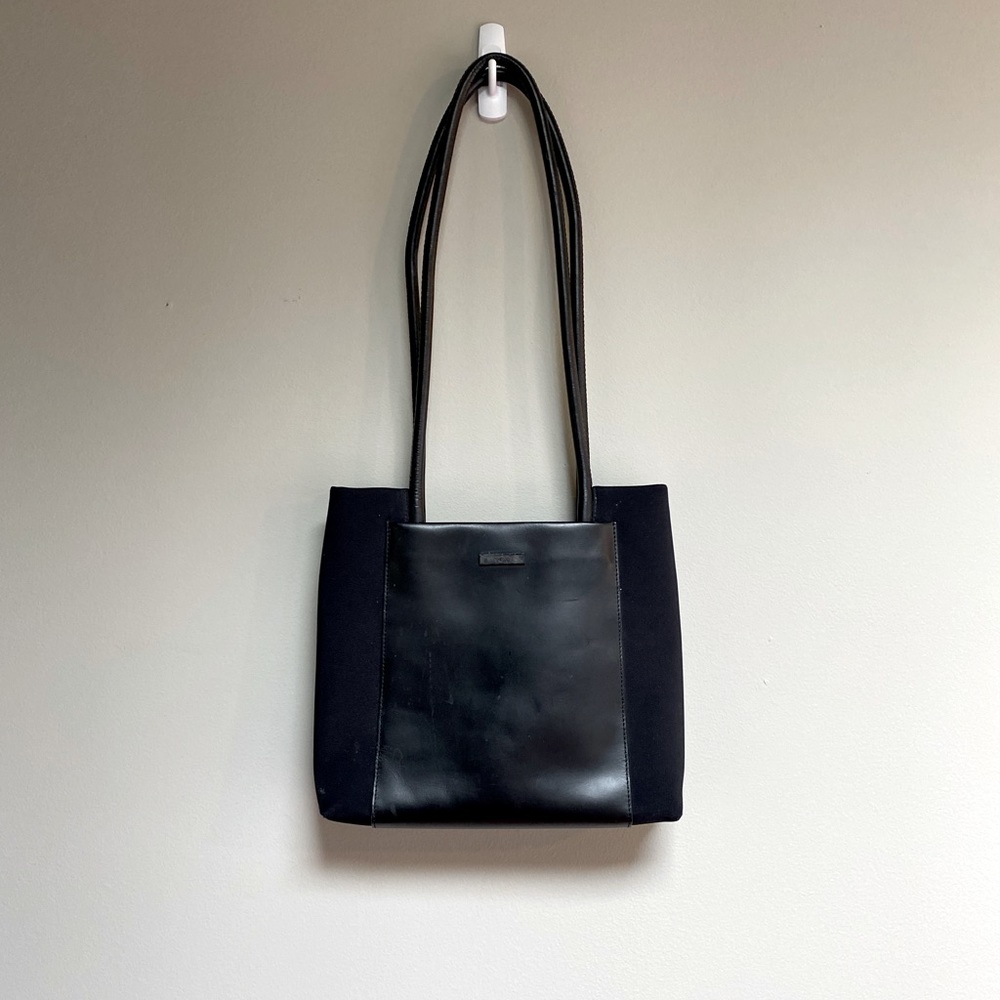Black Tumi handbag / purse
